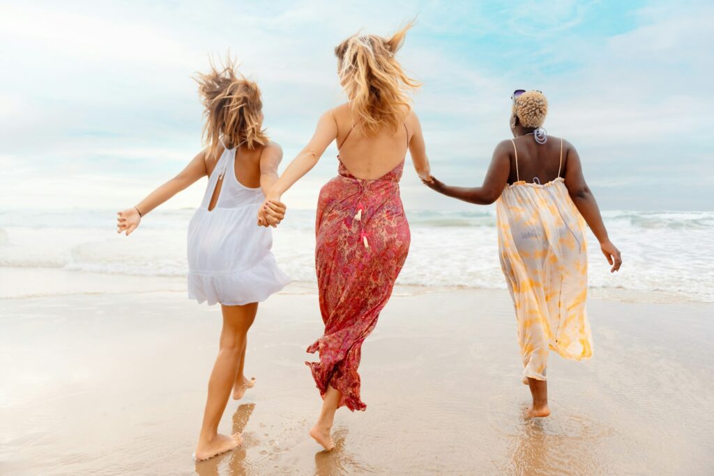 multiracial group of girls on the beach
